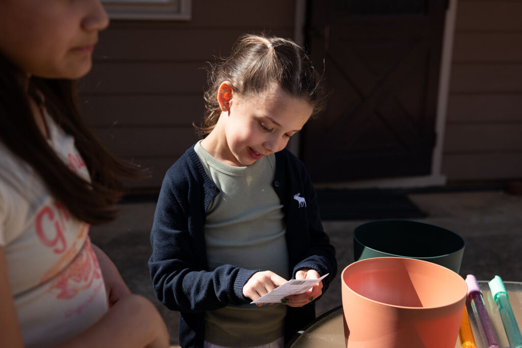 Raleigh family photos documenting real life planing seeds in the spring