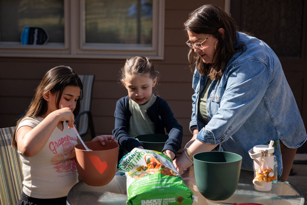 North Hills Raleigh springtime candid documentary family photos planting seeds and gardening at home