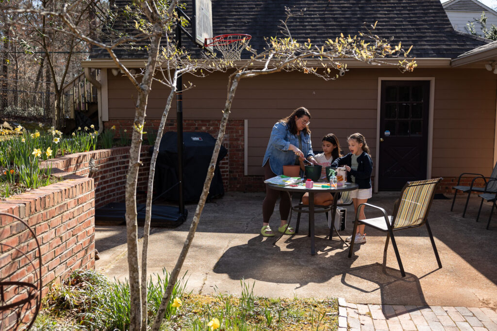 North Hills Raleigh candid documentary photo session planting seeds in the backyard