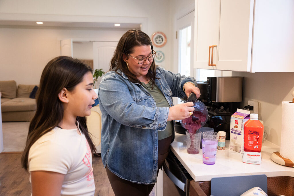 Springtime Candid Documentary Family Photos in Raleigh capturing real life making smoothies in the kitchen at home