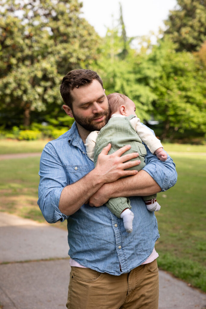 Fred Fletcher Park photo session with baby and family, dad holding 3-month-old