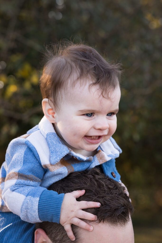 Prairie Ridge Ecostation family photo session, 9-month-old smiling